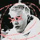 A grainy photo of Justin Bieber with his head circled and his eyes x-ed out