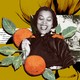A collage that includes a photo of a smiling Zora Neale Hurston