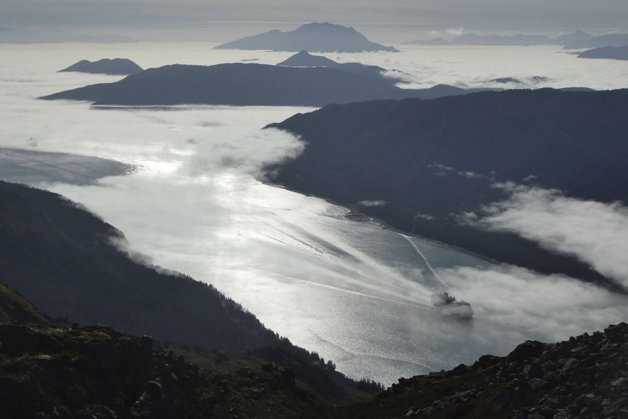 A view of islands and fog, captured from a mountaintop
