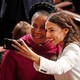 Alexandria Ocasio-Cortez takes a selfie with Representative Sheila Jackson Lee.