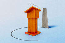 A hand saw cuts a circle into the floor beneath a lectern.