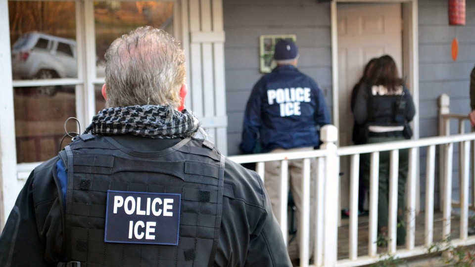 U.S. Immigrations and Customs Enforcement (ICE) officers conduct a targeted enforcement operation