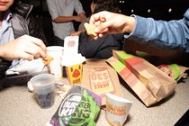 Students share late-night French fries at the Burger King near Northwestern University.
