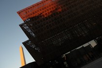 The Smithsonian's National Museum of African American History and Culture with the Washington Monument in the background