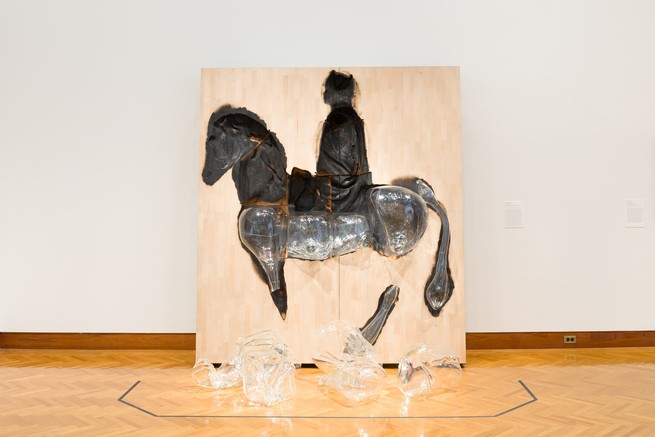 A sculpture depicting a figure on a horse 