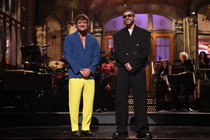Pedro Pascal and Bad Bunny standing on the 'SNL' stage during the latter's monologue