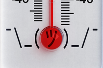 The red bulb of a glass mercury thermometer forms the face in a shrug emoji.