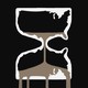 Hourglass shaped like the United States with sand pouring out of the bottom