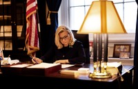 Photo of Liz Cheney at her desk in the U.S. Capitol in 2021