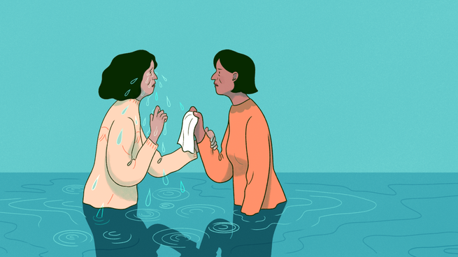 two women stand in a puddle of tears