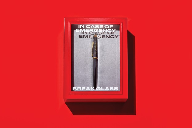 A photo of a pen inside a glass box reading "In Case of Emergency Break Glass"