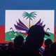 People attend a vigil in honor of Haiti's slain president in Miami's Little Haiti neighborhood.