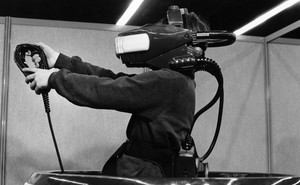 An image of a person wearing VR headset in 1995