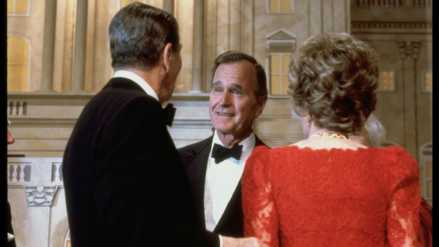 George H. W. Bush in conversation with Ronald and Nancy Reagan