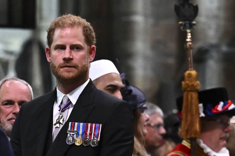 Britain's Prince Harry, wearing several medals