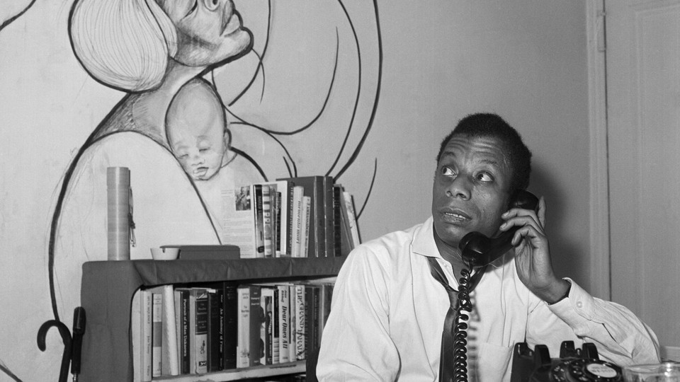 James Baldwin makes a phone call in his New York apartment