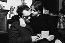 Two people embrace