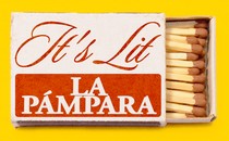Illustration of a matchbox reading "It's lit" / "la pámpara"