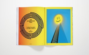photo of May 2022 Atlantic magazine opened to "The Satisfaction Trap" with illustration of ladder leading to happy face