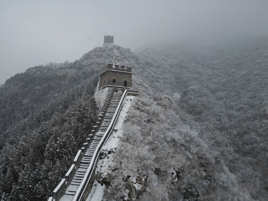 A mountainous section of China's Great Wall is covered by a recent light snow.