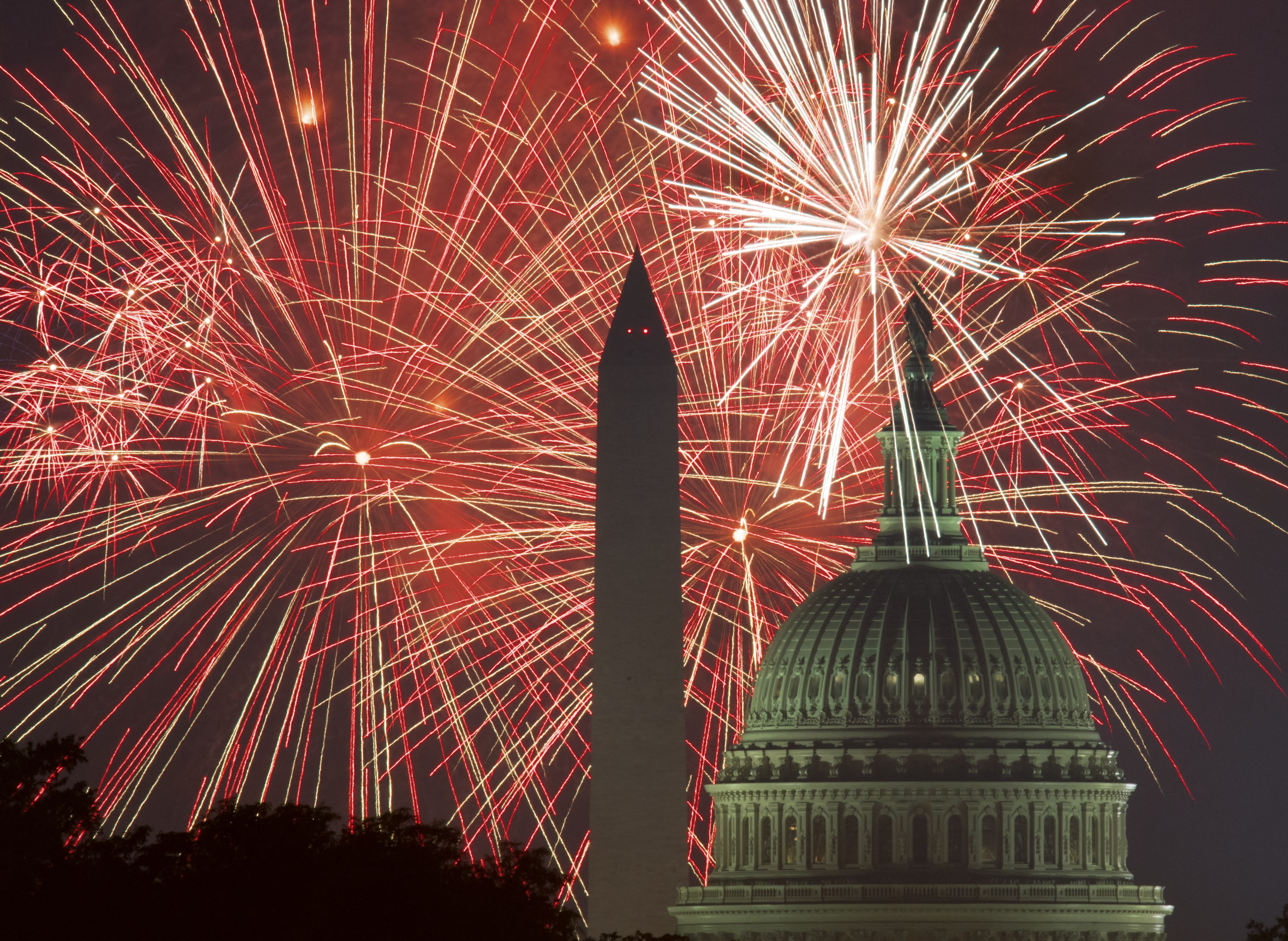 Fireworks explode above the National Mall in Washington, D.C.