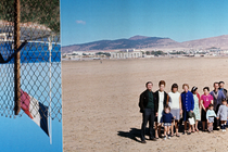 an upside-down French flag next to a photo of a French family in Algeria