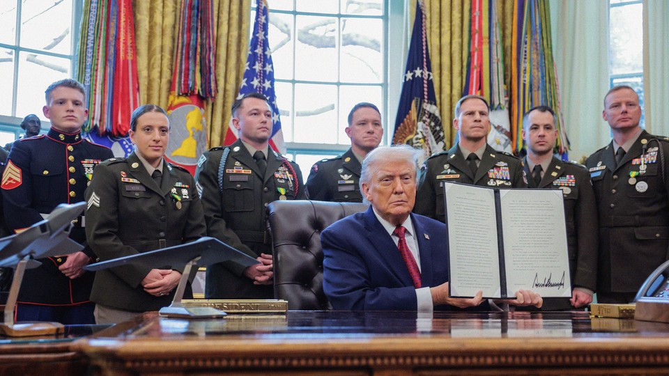 Donald Trump presenting an executive order