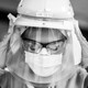 Registered nurse Carmen Verano wipes her CAPR helmet after attending a Covid-19 patient in the Intensive Care Unit (ICU) at Providence Cedars-Sinai Tarzana Medical Center in Tarzana, California on December 18, 2020.