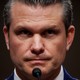 A photo portrait of Defense Secretary Pete Hegseth