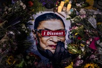 Ruth Bader Ginsburg portrait surrounded by flowers