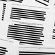 A photo of redacted documents