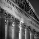 a black and white photo of the Supreme Court