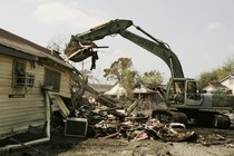 Members of the National Guard clear debris from the roads in New Orleans on September 15, 2005