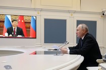 Russian President Vladimir Putin holds a video meeting with Chinese President Xi Jinping at the Kremlin, in Moscow, on December 30, 2022.