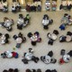 Patrons of a shopping mall sit at tables to eat