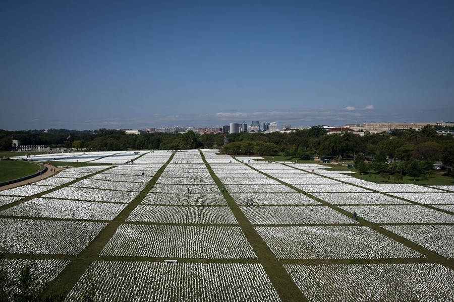 An elevated view of most of the white flags