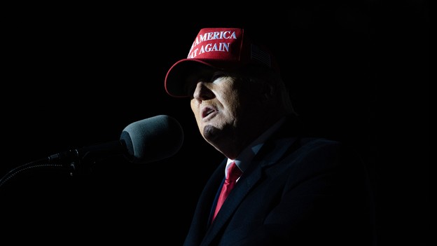 Donald Trump wearing a Make America Great Again hat.