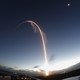 A long-exposure view of the Atlas V rocket, with the Boeing Starliner capsule on top, launching into space this morning