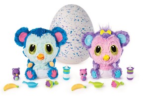 A pair of Hatchibabies toys are displayed alongside their many accessories.