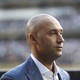 Derek Jeter participates in a ceremony to retire his number at Yankee Stadium