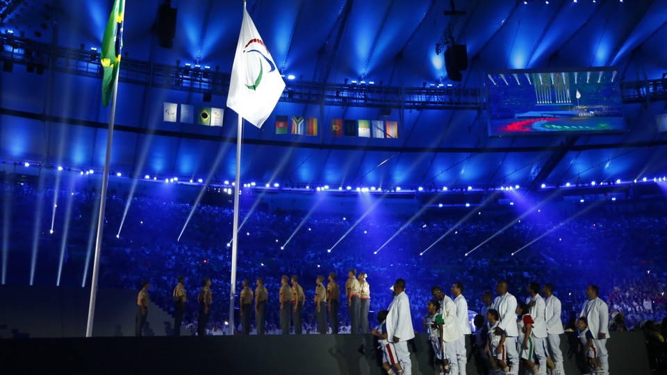 The Brazilian and Paralympic flags are raised during the opening ceremony on September 8.