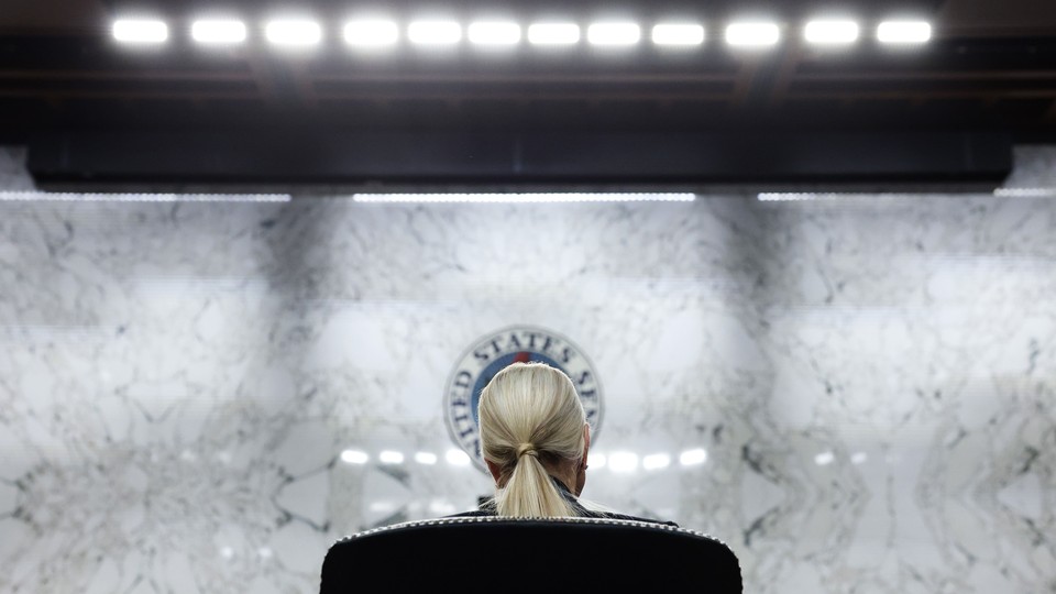 Attorney General Pam Bondi, photographed from behind
