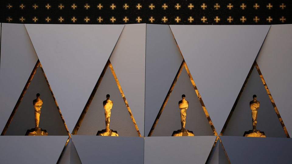 Gold painted Oscar cutouts are constructed as a background for arriving guests and nominees in preparations for the 90th Academy Awards in Hollywood, Los Angeles,
