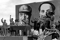 Saluting in front of Mao