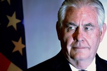 Rex Tillerson in front of an American flag