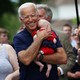 Joe Biden holding a baby