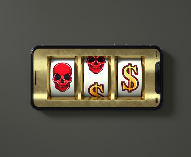Illustration of smartphone with slot-machine skulls