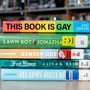 A photo of a stack of LGBTQ-themed books