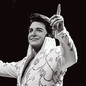Dwight Icenhower dressed as Elvis on stage