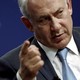 Prime Minister Benjamin Netanyahu  waves a finger menacingly.